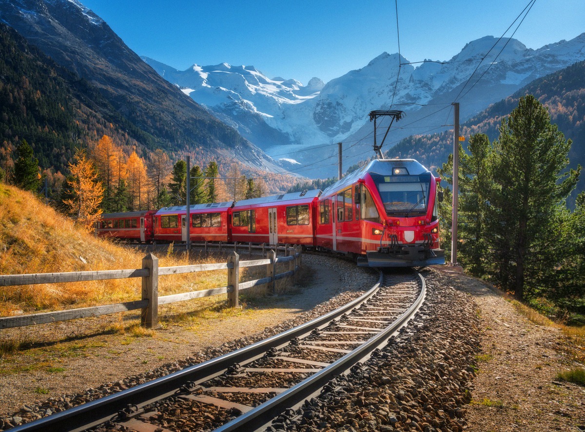 Bernina Railway train on the Montebello Curve below the Morteratsch Glacier