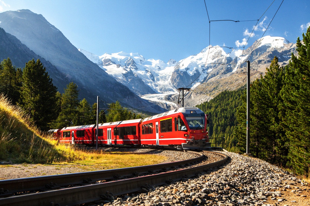 Red Bernina Railway train below the Morteratsch Glacier